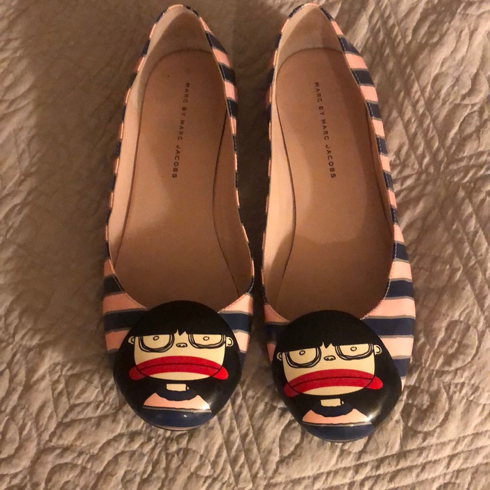 Really fun flats. Have a patent leather type finish.